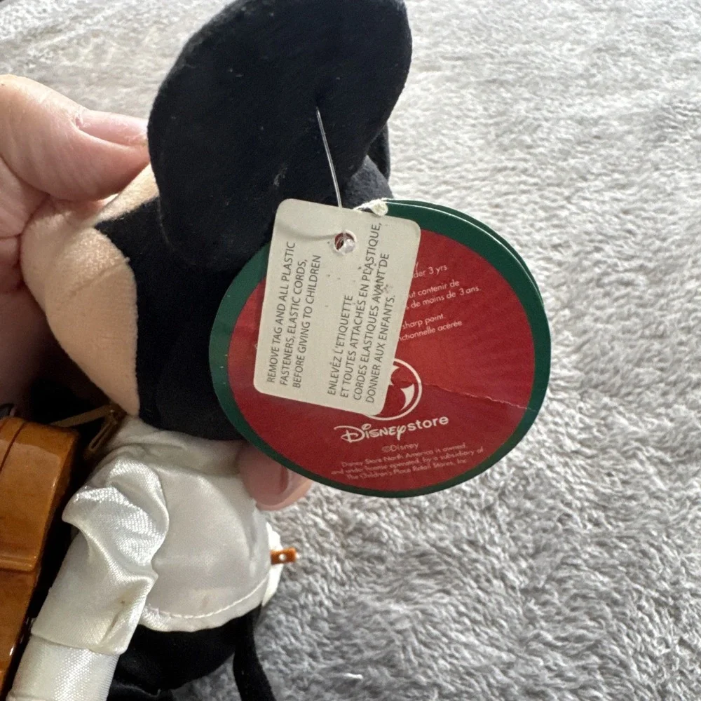 Mickey Mouse In A Tuxedo With A Violin Playing‎ A Violin